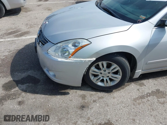 2012 Nissan Altima S with VIN 1N4AL2AP6CN410902, listed as a IAAI auction lot 42147896 with 232,833 mi miles and . Bid and sale history available at carsss.com. Image 6.