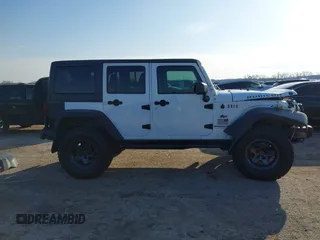 2013 Jeep Wrangler Unlimited Rubicon with VIN 1C4BJWFG0DL529739, listed as a IAAI auction lot 41587047 with 93,116 mi miles. Bid and sale history available at carsss.com. Image 13.