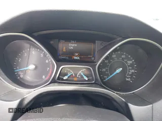2015 Ford Focus SE with VIN 1FADP3F28FL204145, listed as a IAAI auction lot 42107720 with 129,441 mi miles and . Bid and sale history available at DreamBid. Image 7.