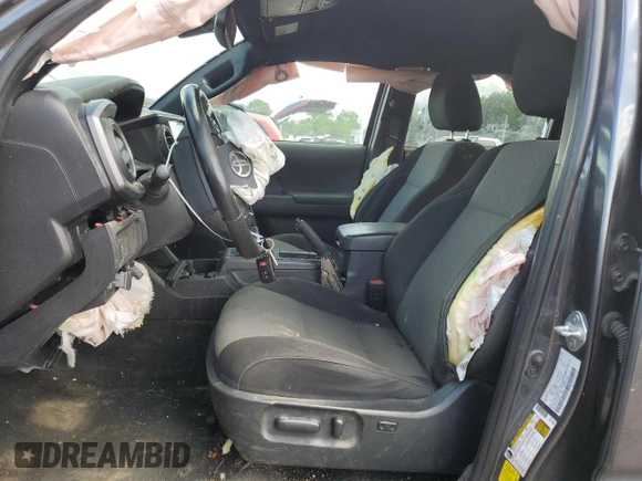 2023 Toyota Tacoma SR with VIN 3TMCZ5AN7PM586455, listed as a Copart auction lot 58191165 with Not provided miles and Salvage title. Bid and sale history available at DreamBid. Image 7.