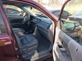 2007 Honda Pilot EX-L with VIN 5FNYF18647B004936, listed as a IAAI auction lot 41656465 with 225,580 mi miles and . Bid and sale history available at DreamBid. Image 5.