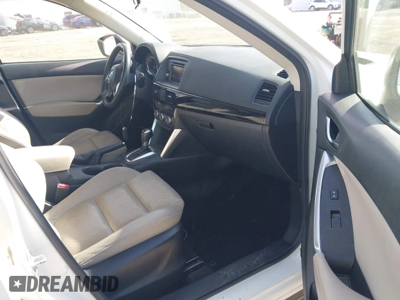 2015 Mazda CX-5 Grand Touring with VIN JM3KE2DY5F0498718, listed as a IAAI auction lot 42070000 with 129,327 mi miles. Bid and sale history available at carsss.com. Image 5.