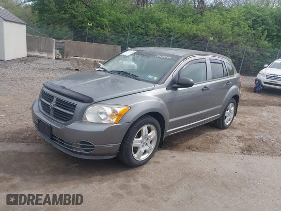 2012 Dodge Caliber SE with VIN 1C3CDWBA4CD533898, listed as a IAAI auction lot 42088488 with 136,650 mi miles and . Bid and sale history available at DreamBid. Image 2.
