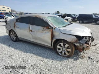 2012 Buick LaCrosse Premium 1 with VIN 1G4GD5E39CF107743, listed as a Copart auction lot 49057875 with 0 mi miles and Salvage Title. Bid and sale history available at carsss.com. Image 4.