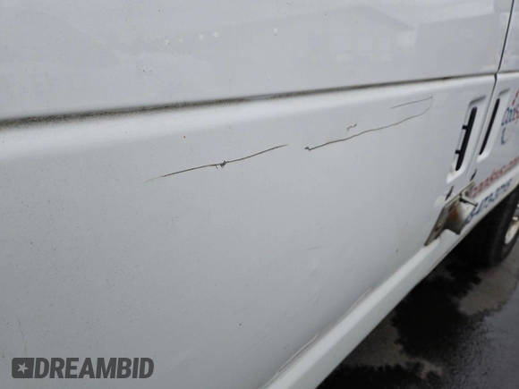 2012 Ford Econoline Cargo Commercial with VIN 1FTNE2EL1CDB12857, listed as a IAAI auction lot 42234010 with 242,380 mi miles and . Bid and sale history available at DreamBid. Image 1.
