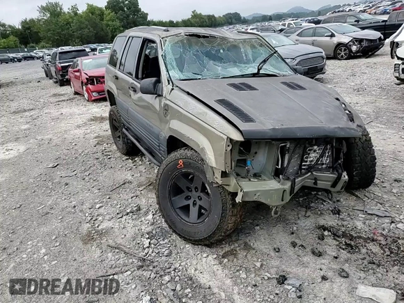 1996 Jeep Grand Cherokee Laredo with VIN 1J4GZ58S3TC297818, listed as a Copart auction lot 67712584 with 284,653 mi miles and Salvage Title. Bid and sale history available at carsss.com. Image 12.