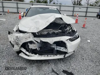 2023 BMW 4 Series 430i with VIN WBA53AP00PCL74865, listed as a Copart auction lot 89057895 with 9,000 mi miles and Salvage title. Bid and sale history available at DreamBid. Image 5.