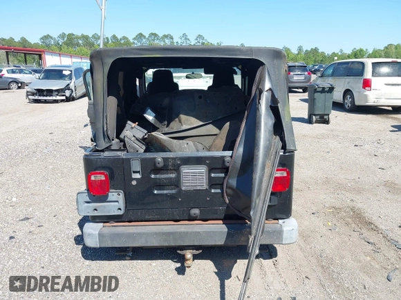 2005 Jeep Wrangler Unlimited with VIN 1J4FA44S25P385421, listed as a IAAI auction lot 42039381 with 1 mi miles. Bid and sale history available at carsss.com. Image 15.