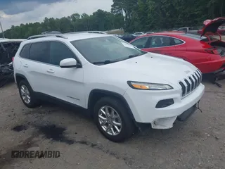 2016 Jeep Cherokee Latitude z VIN 1C4PJMCB3GW237461, wystawiony jako IAAI lot #42495278 z przebiegiem 102 417 mil mil oraz . Historia ofert i sprzedaży dostępna na DreamBid. Obrazek 1.