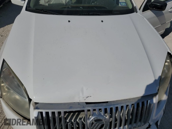 2006 Mercury Milan с VIN 3MEFM07146R600606, выставлен на аукционе Copart как лот 76766344 с пробегом 75 408 миль миль и Списание • Salvage title. История ставок и продаж доступна на DreamBid. Изображение 11.