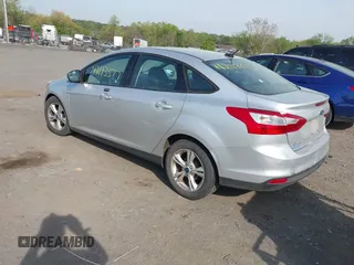 2014 Ford Focus SE with VIN 1FADP3F27EL396785, listed as a IAAI auction lot 42113377 with 147,851 mi miles. Bid and sale history available at carsss.com. Image 3.