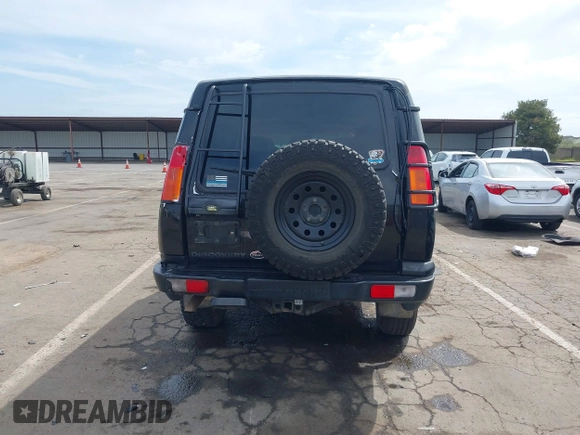 2004 Land Rover Discovery SE with VIN SALTW19464A860565, listed as a IAAI auction lot 42019860 with 153,274 mi miles. Bid and sale history available at carsss.com. Image 17.