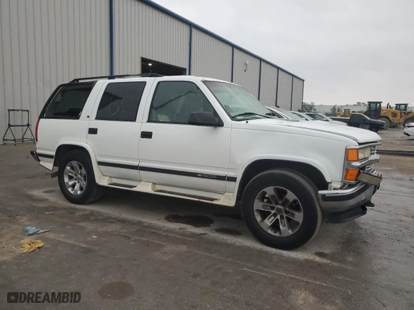 1997 Chevrolet Tahoe with VIN 1GNEK13R2VJ339111, listed as a Copart auction lot 48187215 with 166,260 mi miles and Salvage Title. Bid and sale history available at carsss.com. Image 4.