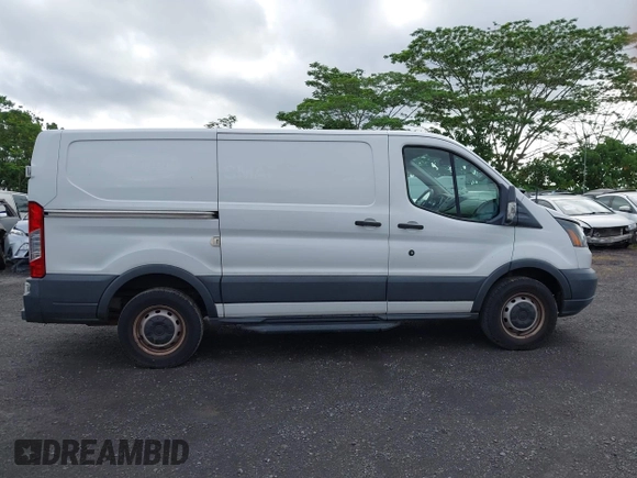 2018 Ford Transit z VIN 1FTYR1YM9JKB43850, wystawiony jako IAAI lot #42151963 z przebiegiem 72 286 mil mil oraz . Historia ofert i sprzedaży dostępna na DreamBid. Obrazek 13.