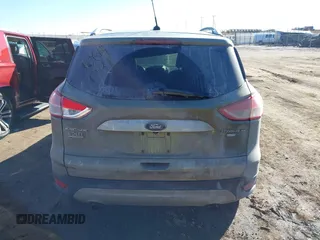 2014 Ford Escape Titanium with VIN 1FMCU9J96EUA15990, listed as a IAAI auction lot 41667046 with 203,202 mi miles. Bid and sale history available at carsss.com. Image 16.