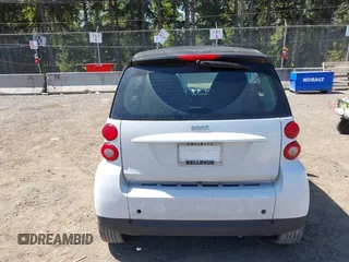 2012 Smart fortwo Pure z VIN WMEEJ3BAXCK563660, wystawiony jako IAAI lot #42165195 z przebiegiem 53 809 mil mil oraz . Historia ofert i sprzedaży dostępna na DreamBid. Obrazek 17.