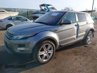 2014 Land Rover Range Rover Evoque Pure Plus z VIN SALVP2BG0EH863440, wystawiony jako IAAI lot #41760065 z przebiegiem 136 997 mil mil oraz . Historia ofert i sprzedaży dostępna na DreamBid. Obrazek 2.