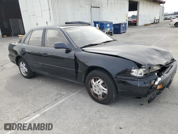 1995 Toyota Camry LE with VIN JT2GK12E2S0079545, listed as a Copart auction lot 84058164 with 150,539 mi miles and Salvage Title. Bid and sale history available at carsss.com. Image 4.