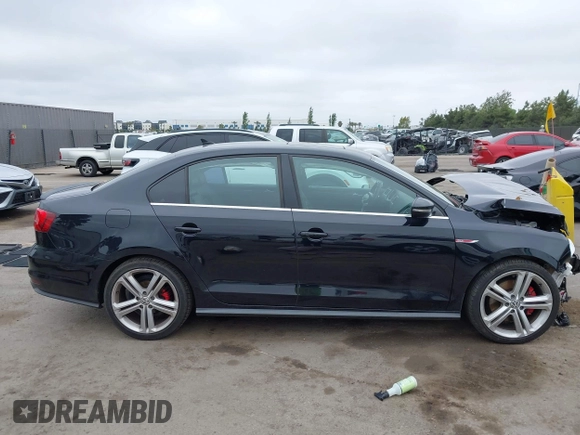 2017 Volkswagen Jetta GLI z VIN 3VW4T7AJ1HM347867, wystawiony jako IAAI lot #42408757 z przebiegiem 82 905 mil mil oraz . Historia ofert i sprzedaży dostępna na DreamBid. Obrazek 14.