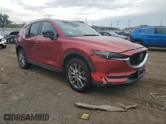 2019 Mazda CX-5 Grand Touring z VIN JM3KFBDM2K0665993, wystawiony jako Copart lot #58440685 z przebiegiem 38 306 mil mil oraz Szkoda całkowita • Salvage title. Historia ofert i sprzedaży dostępna na DreamBid. Obrazek 4.
