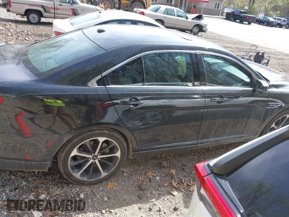 2014 Ford Taurus SHO with VIN 1FAHP2KT8EG131067, listed as a IAAI auction lot 42102086 with 107,822 mi miles. Bid and sale history available at carsss.com. Image 13.