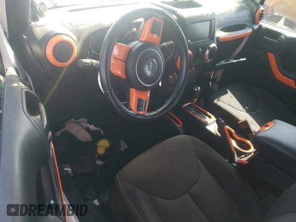 2014 Jeep Wrangler Unlimited Rubicon with VIN 1C4BJWFG4EL325544, listed as a Copart auction lot 61966025 with 149,162 mi miles and Salvage title. Bid and sale history available at DreamBid. Image 8.