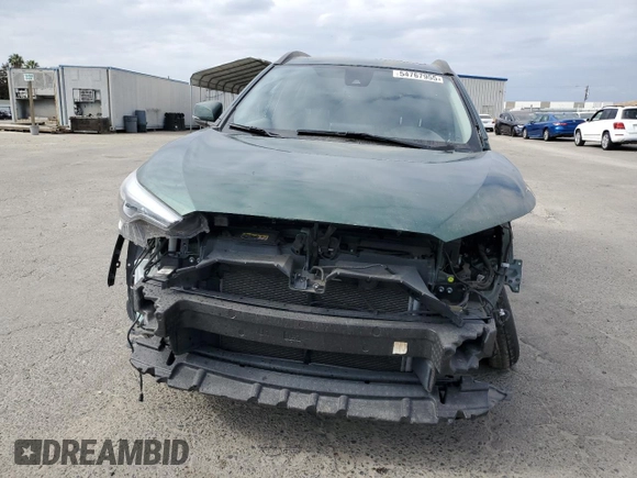 2022 Toyota Corolla Cross XLE с VIN 7MUDAAAG8NV029059, выставлен на аукционе Copart как лот 58739915 с пробегом 62 433 миль миль и Списание • Salvage title. История ставок и продаж доступна на DreamBid. Изображение 5.