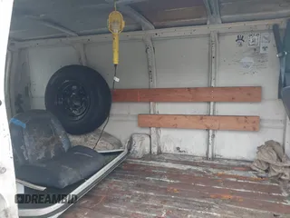 1990 Ford Econoline Cargo with VIN 1FTDE14N0LHA80405, listed as a IAAI auction lot 41824747 with 91,278 mi miles and . Bid and sale history available at DreamBid. Image 8.