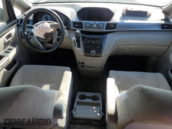 2013 Honda Odyssey LX z VIN 5FNRL5H26DB058364, wystawiony jako Copart lot #52984905 z przebiegiem 165 779 mil mil oraz Szkoda całkowita • Salvage title. Historia ofert i sprzedaży dostępna na DreamBid. Obrazek 8.