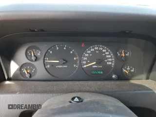 1999 Jeep Grand Cherokee Limited with VIN 1J4GW68N4XC679841, listed as a Copart auction lot 59760015 with 155,366 mi miles and Salvage title. Bid and sale history available at DreamBid. Image 9.