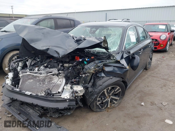 2024 Honda Civic LX z VIN 19XFL2H5XRE023870, wystawiony jako IAAI lot #41776260 z przebiegiem Nie podano mil oraz . Historia ofert i sprzedaży dostępna na DreamBid. Obrazek 16.