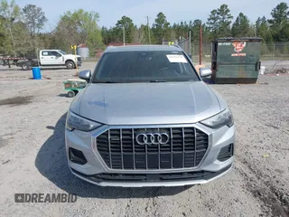 2020 Audi Q3 Premium with VIN WA1AECF36L1057823, listed as a IAAI auction lot 41912118 with 71,004 mi miles and . Bid and sale history available at DreamBid. Image 12.