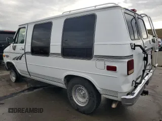1995 Chevrolet Chevy Van z VIN 1GBEG25H0SF243534, wystawiony jako Copart lot #64175964 z przebiegiem 134 916 mil mil oraz Szkoda całkowita • Salvage title. Historia ofert i sprzedaży dostępna na DreamBid. Obrazek 2.