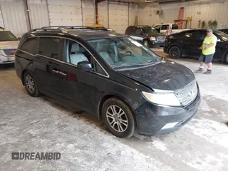 2011 Honda Odyssey EX-L with VIN 5FNRL5H65BB091758, listed as a IAAI auction lot 42712942 with 240,819 mi miles and . Bid and sale history available at DreamBid. Image 1.