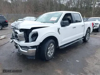 2021 Ford F-150 XL with VIN 1FTEW1CP6MFB24439, listed as a IAAI auction lot 41705331 with 76,463 mi miles. Bid and sale history available at carsss.com. Image 2.