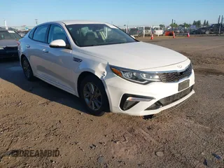 2020 Kia Optima LX z VIN 5XXGT4L31LG390175, wystawiony jako IAAI lot #42277211 z przebiegiem 170 552 mil mil oraz . Historia ofert i sprzedaży dostępna na DreamBid. Obrazek 1.