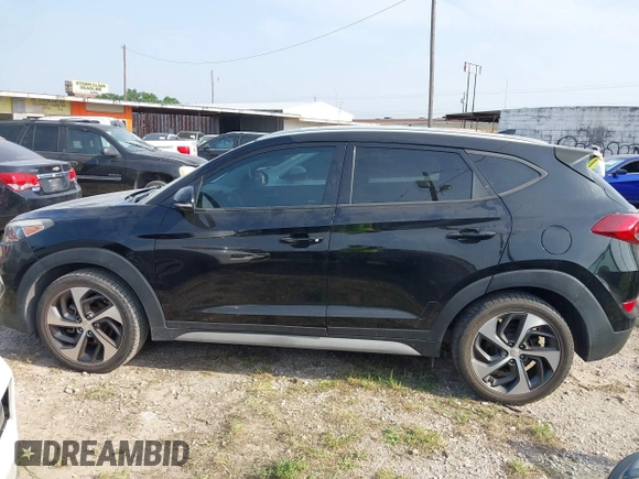 2018 Hyundai Tucson Sport z VIN KM8J33AL5JU741563, wystawiony jako IAAI lot #41928357 z przebiegiem 97 004 mil mil oraz . Historia ofert i sprzedaży dostępna na DreamBid. Obrazek 14.