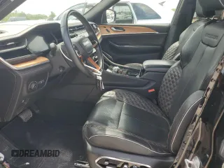 2022 Jeep Grand Cherokee Summit Reserve with VIN 1C4RJHETXN8503565, listed as a Copart auction lot 63758425 with 57,598 mi miles and Salvage title. Bid and sale history available at DreamBid. Image 7.