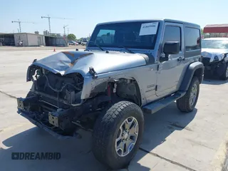 2014 Jeep Wrangler Sport with VIN 1C4AJWAG9EL155409, listed as a IAAI auction lot 41869906 with 102,400 mi miles and . Bid and sale history available at carsss.com. Image 19.