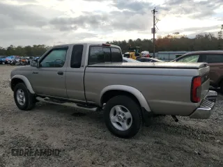 2000 Nissan Frontier XE z VIN 1N6ED26T5YC413840, wystawiony jako Copart lot #81996434 z przebiegiem 189 884 mil mil oraz Szkoda całkowita • Salvage title. Historia ofert i sprzedaży dostępna na DreamBid. Obrazek 2.