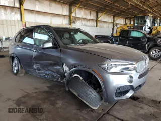 2014 BMW X5 xDrive50i z VIN 5UXKR6C57E0J71844, wystawiony jako Copart lot #54399675 z przebiegiem 79 898 mil mil oraz Szkoda całkowita • Salvage title. Historia ofert i sprzedaży dostępna na DreamBid. Obrazek 4.