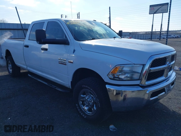 2013 Ram 2500 Tradesman z VIN 3C6TR5HT9DG575642, wystawiony jako IAAI lot #41557823 z przebiegiem 223 859 mil mil oraz . Historia ofert i sprzedaży dostępna na DreamBid. Obrazek 1.