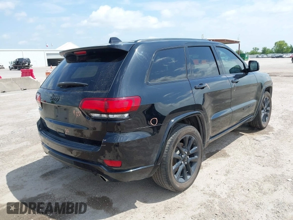 2019 Jeep Grand Cherokee Altitude with VIN 1C4RJEAG0KC857787, listed as a IAAI auction lot 42434646 with 193,968 mi miles and . Bid and sale history available at DreamBid. Image 4.