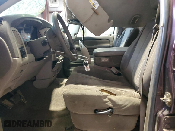 2004 Dodge 1500 SLT with VIN 1D7HA18N94S705188, listed as a Copart auction lot 49967065 with 263,022 mi miles and Salvage Title. Bid and sale history available at DreamBid. Image 7.