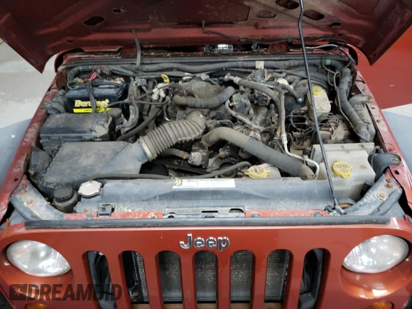2009 Jeep Wrangler Unlimited X с VIN 1J8GA39139L788480, выставлен на аукционе Copart как лот 63013635 с пробегом 166 007 миль миль и Чистый • Clean title. История ставок и продаж доступна на DreamBid. Изображение 11.