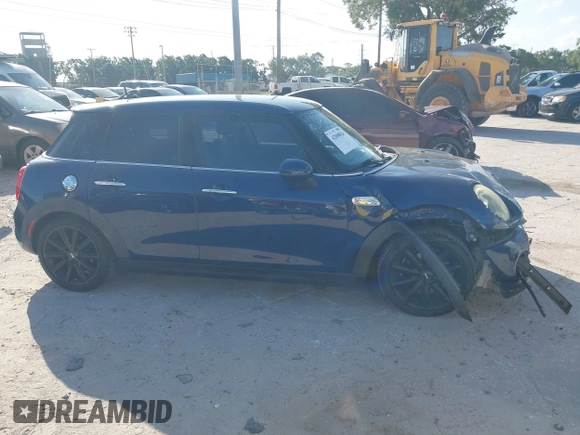 2016 MINI Cooper Hardtop 4 Door S with VIN WMWXU3C54G2D30766, listed as a IAAI auction lot 42008026 with 101,898 mi miles. Bid and sale history available at carsss.com. Image 13.