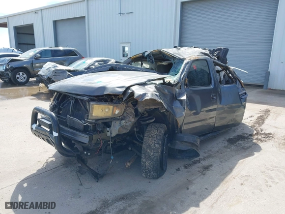 2012 Honda Ridgeline RTS with VIN 5FPYK1F4XCB451706, listed as a IAAI auction lot 40414404 with 153,444 mi miles. Bid and sale history available at carsss.com. Image 2.
