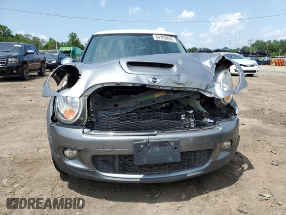 2007 MINI Hardtop S with VIN WMWMF73577TT84087, listed as a Copart auction lot 60208895 with 76,248 mi miles and Salvage title. Bid and sale history available at DreamBid. Image 5.