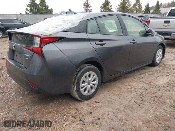 2021 Toyota Prius L Eco with VIN JTDKAMFU6M3140081, listed as a IAAI auction lot 42131187 with 103,973 mi miles and . Bid and sale history available at DreamBid. Image 4.