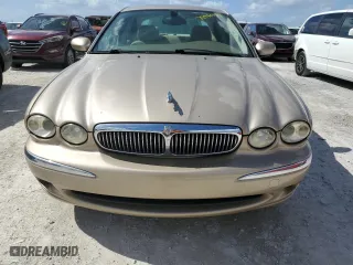 2004 Jaguar X-Type with VIN SAJEA51C34WE03194, listed as a Copart auction lot 78980144 with 51,164 mi miles and Clean Title. Bid and sale history available at carsss.com. Image 5.